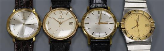 Four assorted gentlemans stainless steel and gold plated Omega wrist watches including Seamaster and Constellation.